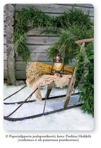 Joulun valmisteluita (lyhty ja lyhde potkukelkassa), joulupostikortti